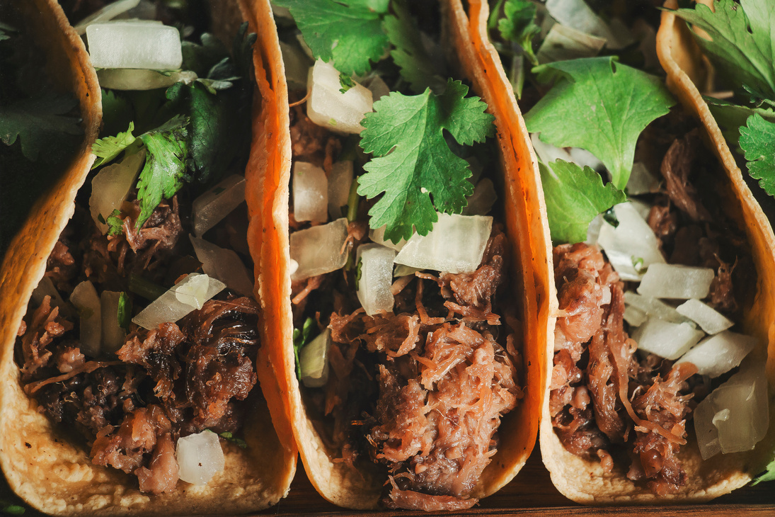 Authentic Mexican Tacos of Barbecue with Coriander and Onion Close-up